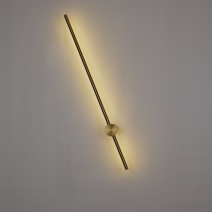 The Nordic Light Stick • 2-Pack by XCEPTION is a contemporary wall light fixture that showcases a sleek, horizontal rod casting a gentle, warm yellow glow. This elegant rod intersects with a circular base mounted on a plain wall, creating an understated and sophisticated lighting ambiance.