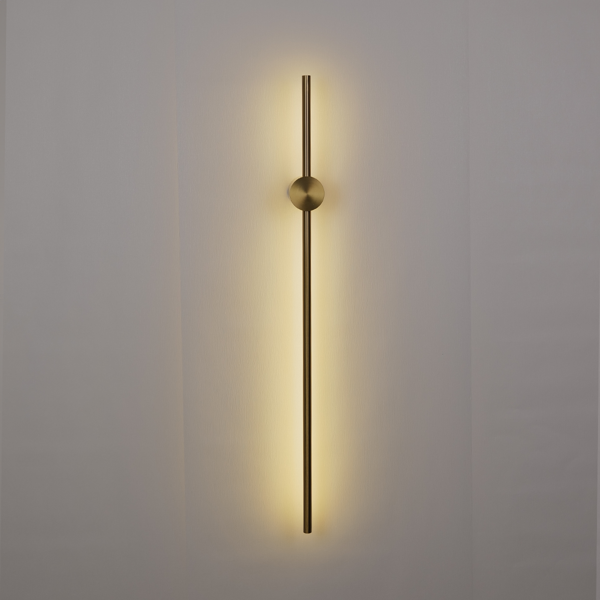 The XCEPTION Nordic Light Stick • 2-Pack features a minimalist wall light design with a vertical metal rod that casts a warm, yellow glow on the wall. Its modern aesthetic is enhanced by a central spherical accent.